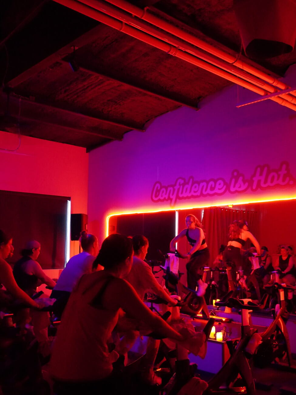Riders in pink light