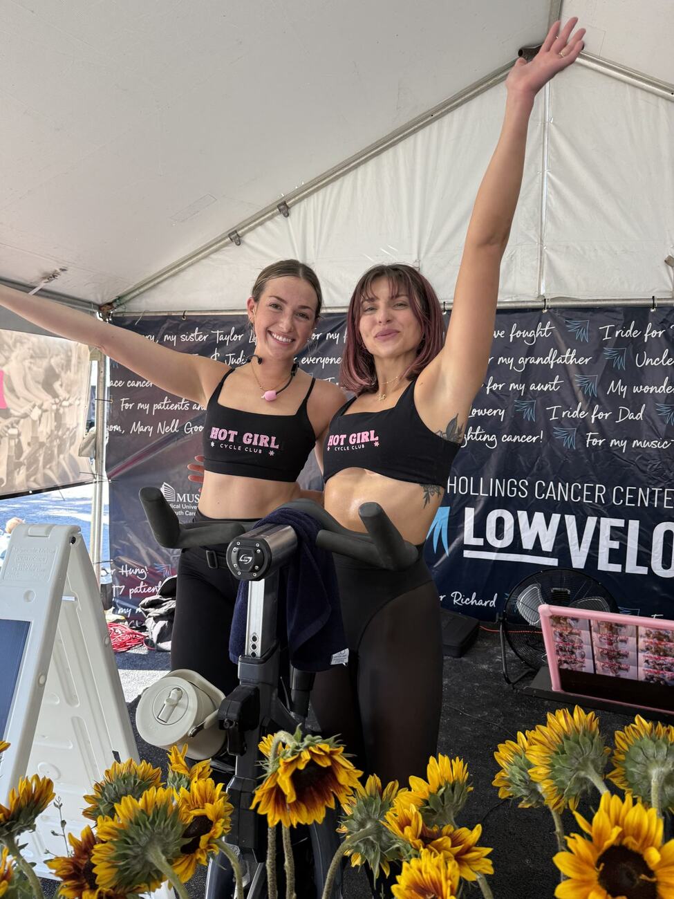 Riders posing on bikes at an event